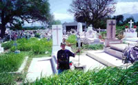 Sean Standing Near the Family Plot